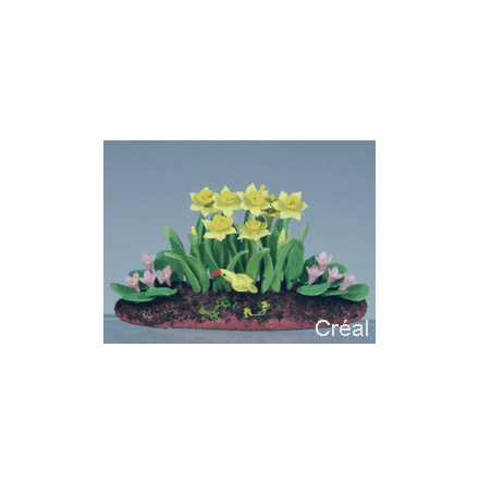 Tr�dg�rdsland med blommor
